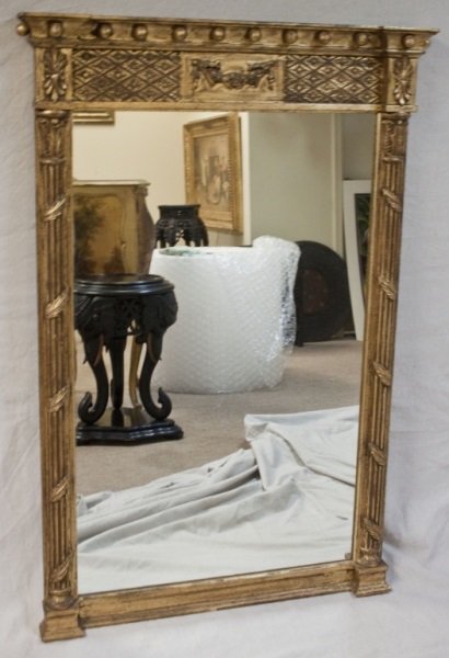 Renaissance Wood Carved Gold Gilt Mirror: Renaissance style carved wood mirror with columns and beaded cornice. Dimensions: 33.5" x3.25" x 50.5 Period: Mid century