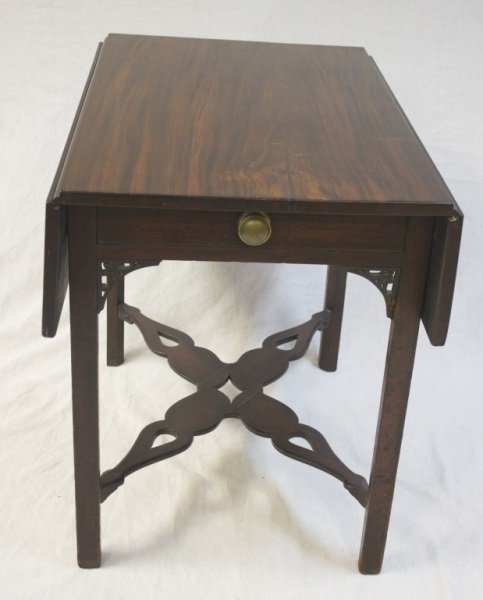 Early19thC Chinese Chippendale Walnut Table: Early19th century Chinese Chippendale walnut drop leaf table with stretcher. Table measures 21" x 31" x 27.5". Dimensions: See description Period: Early 19th Century