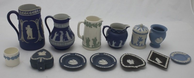 13 Pieces Of Wedgewood Jasperware: 13 Pieces of Wedgewood, lot includes; Large Etruscan-shape water jug in blue Jasperware. Measures 3" dia at base x 6" tall. Blue water pitcher. Measures 4.5" dia x 7.5" tall. Queens ware glazed jug. M