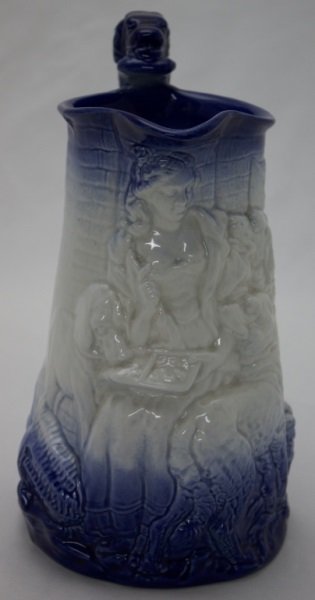 19C Burleigh English Ironstone Pitcher Women Dogs: 19th Century Burleigh Ironstone Staffordshire England, blue and white milk pitcher with 3D relief and a dog form handle of a women with her dogs. 7" x 6.5" x 10" 1890's