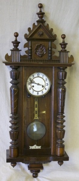 German Wood Case Wall Clock w Chimes: German wood cased wall clock with chimes. 16" x 7" x 33" 1900