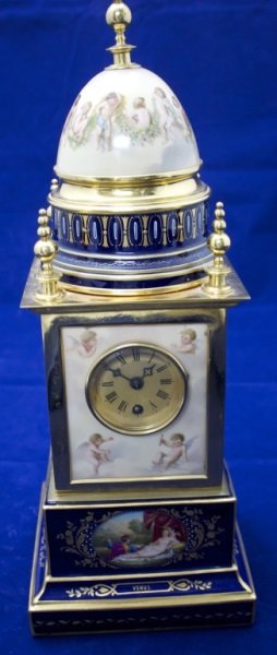 19thC Royal Vienna "Venus" Porcelain & Brass Clock: 19th Century Royal Vienna "Venus" and "Cupido U Aglaia" porcelain & brass clock. Beehive mark under glaze. Decorated with Venus and cupid on all sides. 7" x 7" x 19" 19th century