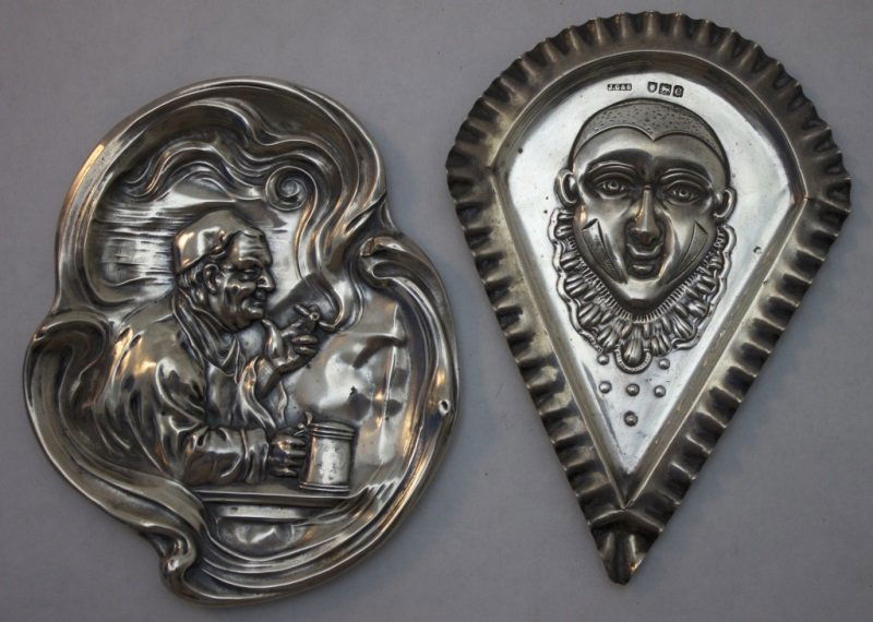 2 19thC Sterling Silver Hand Chased Figural Trays: 2 19th Century sterling silver hand chased figural ash trays. Art Nouveau Old man with pipe and pint of beer is 3.75" x 4.5' Jester is 3.5" x 5" see description 19th century 1.4 oz t
