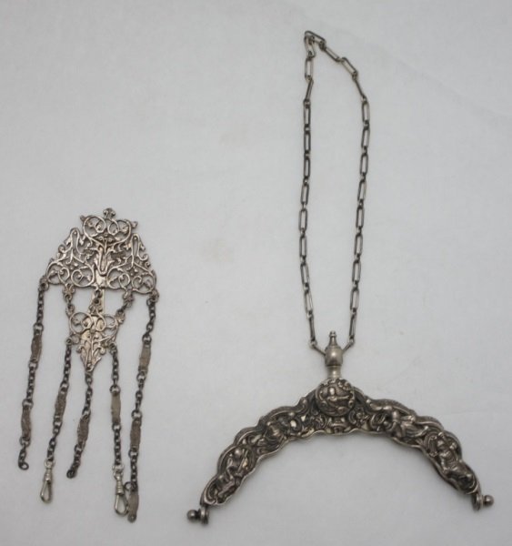Sterling Silver Chatelaine & Gorham Purse Frame: Sterling Chatelaine and purse frame, lot includes, Sterling chatelaine with 5 chains, makers marked. Measures 6" x 2.5". Sterling purse frame, Marked Gorham with makers marks. Measures 6" x 1". See De