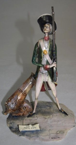 T Moretto Marine Corps USA 1780 Soldier Sculpture: Moretto, Toni (Italian, 1929 – 2011) Marine Corps USA 1780 soldier sculpture with cannon and flintlock rifle. 6.25" x 5.5" x 9.5" 1980's