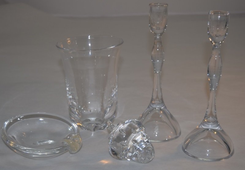 Kosta Candleholders, Orrefors Vase, Steuben Bowl +: Kosta candleholders, measure3" dia x 9", Orrefors vase,measures 4.5" dia x 6", Steuben bowl, measures 5" dia x 1.75" and a crystal strawberry, measures 3"dia x4".