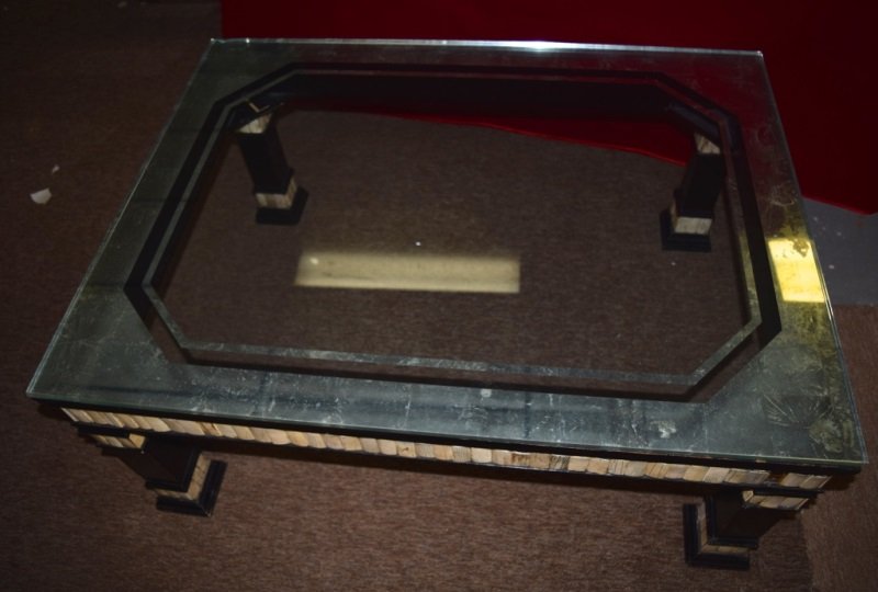 Redmile Black Lacquer, Bone & Glass Coffee Table: Redmile black lacquer wood and bone with a mirrored glass top coffee table. Glass is mirrored, one bone fragment missing. 33" x 44" x 16" 1980's