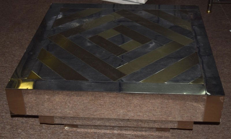 1970's Patchwork Chrome & Brass Coffee Table: 1970's Patchwork Chrome & Brass Coffee Table. 1970's Patchwork chrome and brass coffee table with a 2 tier base, in the manner of Paul Evans mfg possibly by Pace. 42" x 42" 15.5" 1980's