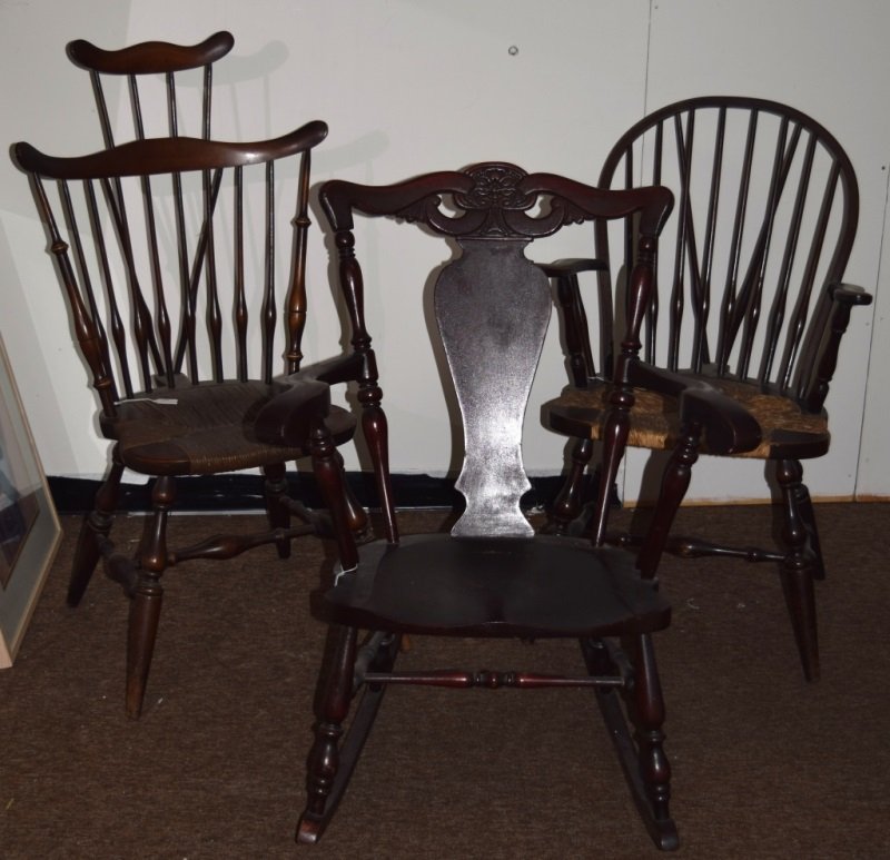 3pcs, Victorian Rocker & 2 Fanback Windsor Chairs: Fanback Windsor chair with a rush seat, measures 23.5" x 43". Saddleback Windsor arm chair with a rush seat, measures 24" x 36.5". Victorian carved mahogany rocker with arms, measures 27" x 36". 1890'