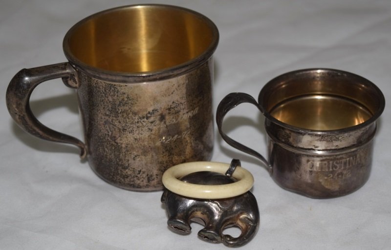 2 Sterling Baby Cups & Elephant Rattler/Teether: 2 Sterling silver baby cups and an elephant form rattling teether. Minor wear to small cup see photos, Large cup is 2.5" dia by 2.75 Weight is 6.2 ozt 20th century