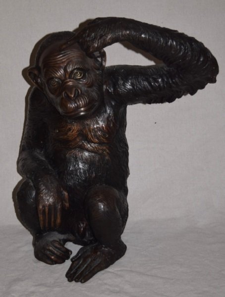 Bronze Seated Monkey Sculpture: Bronze sculpture of seated monkey with extended finger scratching head. 22" x 18" x 27" Modern