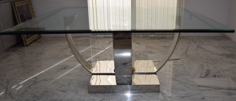 Michael O Designs Custom Dining Table: Michael O Designs custom dining table. An elegant dining table with (4) ½” thick stainless steel arms polished to a mirror finish. Polished brass detail in the center on a mirror finished stainless