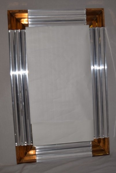 Karl Springer Style Lucite & Gold Brass Mirror: Large Karl Springer style Lucite mirror with gold tone polished brass embellishments. 36" x 2.5" x 57" 1980's