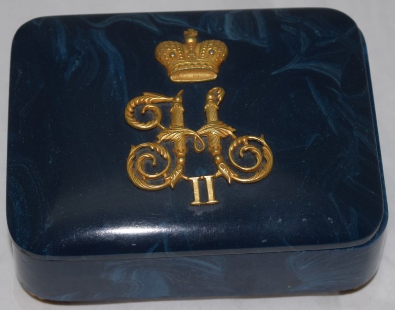 Box w/ Russian Double Headed Eagle Coat Of Arms: Russian marblized footed dresser box decorated inside and out with dore bronze insignia, a crown and a Russian double headed eagle and coat of arms. 6" x 5" x2.75" USSR