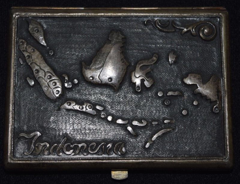 800 Silver Cigarette Case w Embossed Details: 800 Silver Cigarette Case with embossed details showing a map of the Indonesian Islands. Total weight 4.05 ozt 4.25 x 3.25 x .5" 1960's