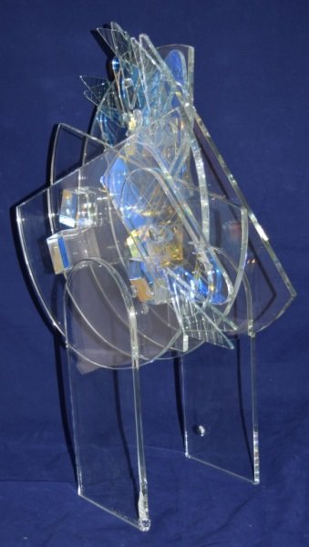 Toland Peter Sand Art Glass Sculpture: Toland Peter Sand (America, b. 1949) abstract art glass sculpture with fused opalescent glass in an etched geometric pattern. Small loss at base see photos. 20" x 8" x 26" 1990's