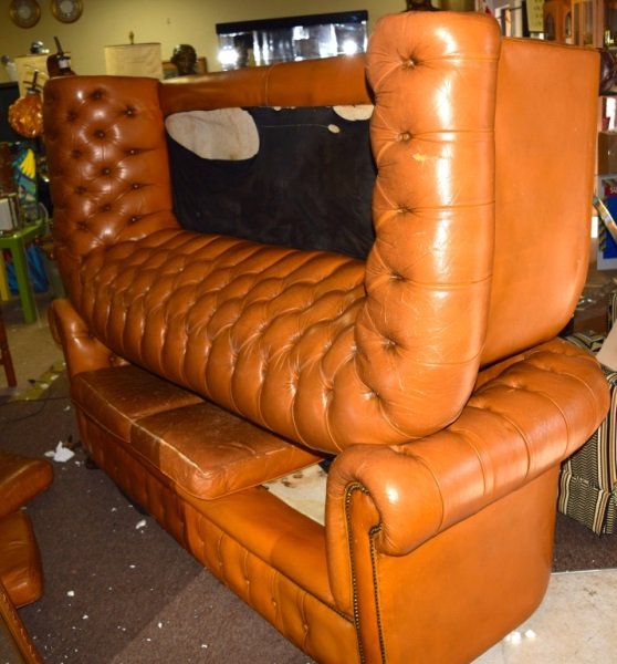 Pair of Tufted Leather English Sofas: Pair of tufted leather English sofas. Damage to cushions see photos. 79" x 34" x 26" 1950s