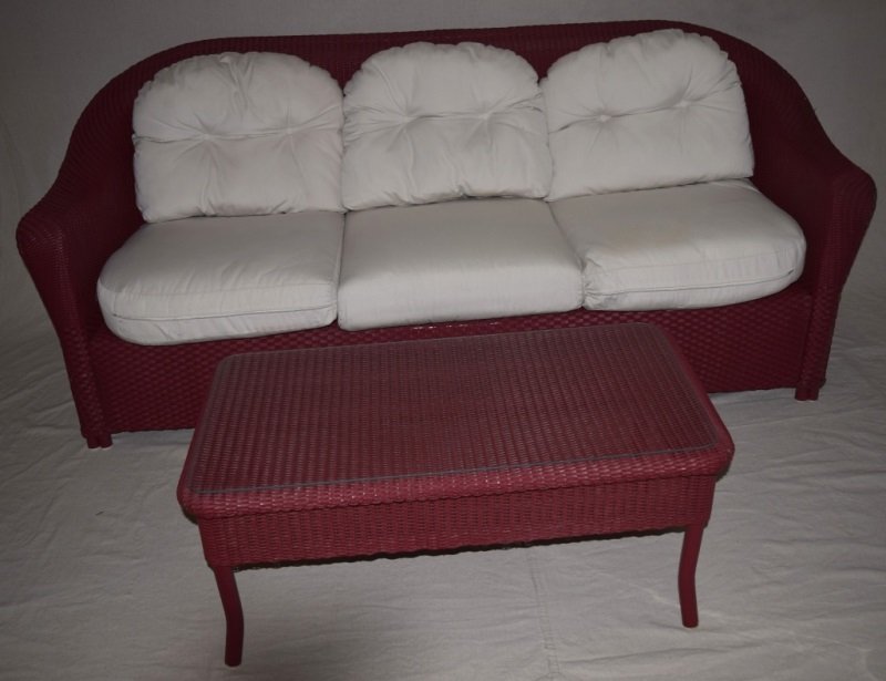 Lloyd Loom Outdoor Belvoir Sofa & Coffee Table: Lloyd Loom Wicker Outdoor Belvoir - All Weather Sofa. Color is now faded signal red, but may easily be made your color of choice. Comes with white cushions. Couch Measures 88" x 36" x 36". Lloyd Loom 