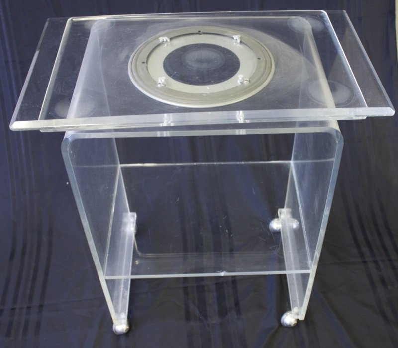 1970's Lucite Cart w/ Swivel Top Mounted on Wheels: 1970's Lucite Cart with a swivel top mounted on wheels. 28" x 16" x 31" 1970's