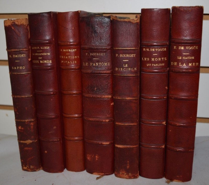 French Leather Bound Books.Classic French Novels: Set of 7 matching red leather bound French Classics. "Sapho" A. Daudet © 1884. "Sensations D'Italie" Abbe F. Klien © 1902. "Le Fantôme" Paul Bourget © 1901. "Le Disciple" Paul Bourget © 1889. "Le