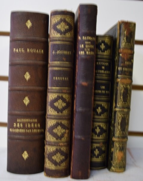French Leather Bound Books. Classic Novels&Essays: Assortment of five leather bound books. Black and brown spines with gold trim. "De L'Arcade et des Éstudes de la Nature" Paul et Virginie © 1891. "Le Signe sur le Mains" Emile Baumann(worn spine) ©
