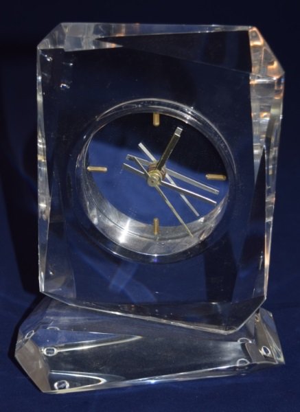 Lucite Prismatic Form Desk Clock sg George "82": Lucite prismatic and geometric form desk clock with a mirrored face signed George "82" well crafted and polished. 7" x 3.5" x 9.5"
