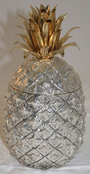 Pineapple Ice Bucket by Mauro Manetti, Italy 1970s: Pineapple ice bucket, chrome finish cast metal with brass leaves attributed to Mauro Manetti, Marked Italy, see photos with marking to underside. Interior liner and silver plated ice separator. 5.5" d