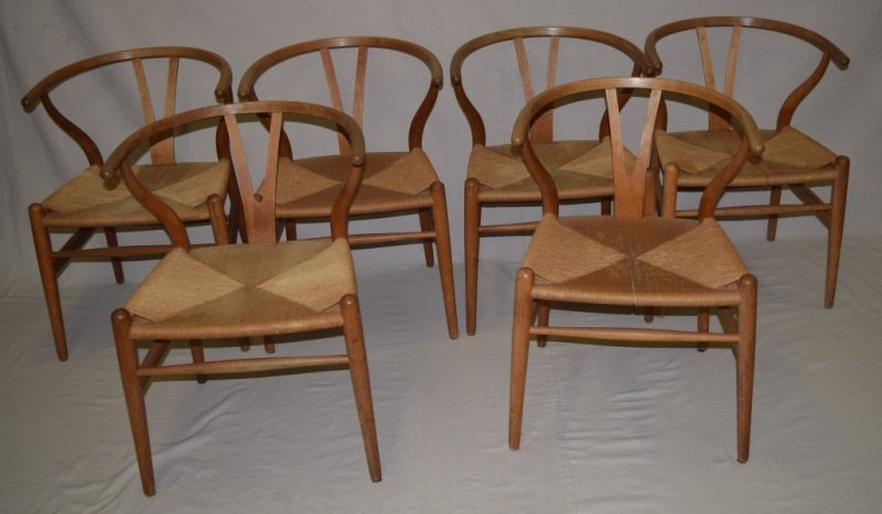 6 Hans Wegner, Wishbone Chairs Branded Carl Hansen: Hans Wegner, Wishbone chairs, set of 6, Branded Carl Hansen & Son, Denmark, oak, paper cord, all signed with branded marks. Very clean well kept with all joints tight and original condition. 21" x 20"