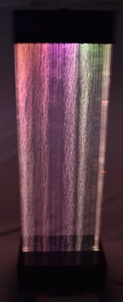 Lucite Sculpture Bubble Wall w Disco Lights: Lucite Sculpture Bubble machine with light. 80" Tall, 25" wide and 15" deep. Comes with colored lights which is mounted in the top panel. 25" x 15" x 81"