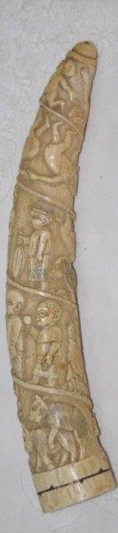 African Kongo Peoples Islamic Carved Ivory Tusk: 19th Century Kongo Peoples Carved African Elephant Ivory Tusk, Origin Loango, West Africa. Inlaid metal eyes and details. Minor loss to banding inlay at base, inner chip.Collected by an aviator who is