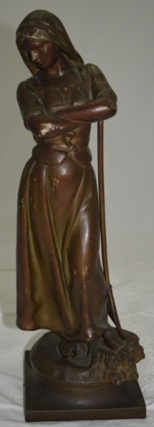 1920s Bronze Patinated Farm Woman w Pitchfork: 1920s Bronze patinated cast metal sculpture of a WPA style farm woman with a pitchfork. Shows stress crack on one ankle 5.5" x 5.25" x 17"