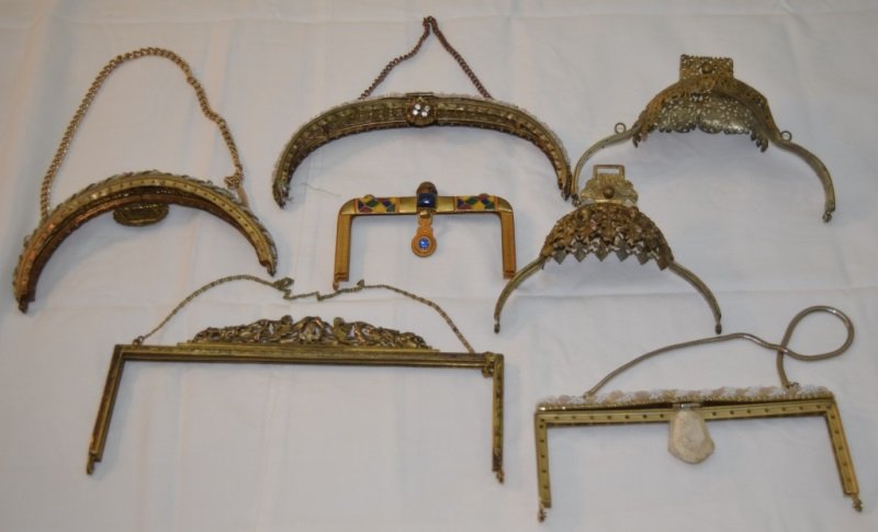 7 Gold Gilt / Hand Beaded Purse Frames: Lot of 7 antique purse frames. Variety of hand beaded, rhinestones, and golf filigree details.