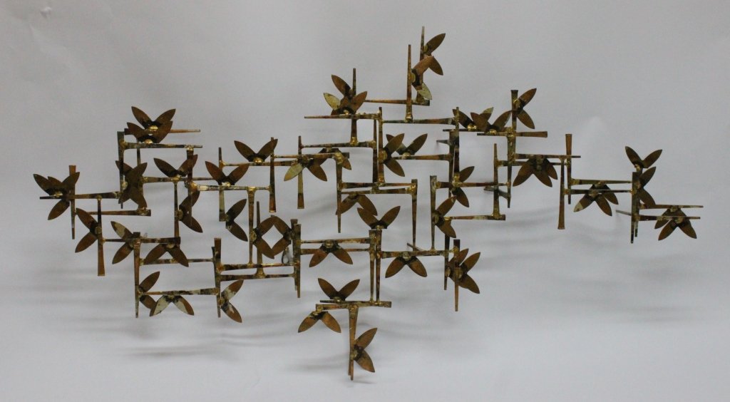 Mid Century Mod Horseshoe Nail Wall Sculpture: Mid century modern horseshoe nail wall sculpture. Brazed together, and well coated with brass highlights. 39" x 4.5" x 20.5"