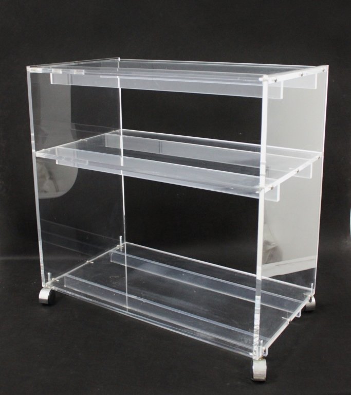 Mid Century Modern Lucite 2-Tiered Cart: Mid century modern 2-tiered Lucite wheeled cart. 27" x 15" x 27"