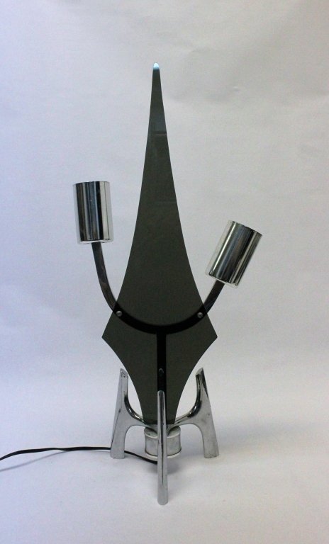 Vintage MCM Chrome & Smoked Lucite Atomic Age Lamp: 1960's, Mid Century Modern chrome and smoked Lucite sputnik lamp with two lamp arms on a chrome rocket ship base. Manner of Robert Sonneman. Very good, working condition. 7" d x 22.5"