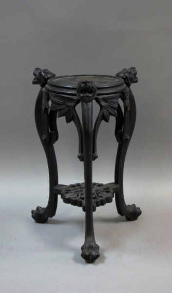 19C Lion Headed & Claw Footed Ebony Pedestal Table: 19th Century lion headed and claw footed ebony pedestal table. Very good condition, with losses (see photos). Measures 16"d x 25"