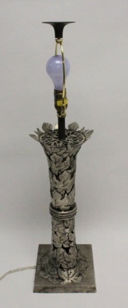 Vintage Chapman Maple Leaf Table Lamp: Vintage Chapman nickel-polished steel table lamp decorated with an overlay of maple leaves. Excellent condition. Measures 8" x 8" x 24" (to socket).