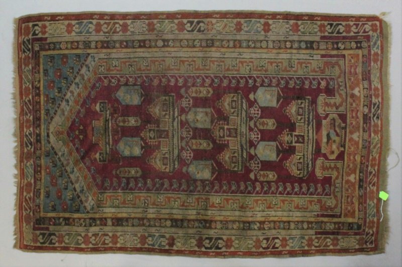 Early Oriental Wool on Wool Prayer Rug: Antique Oriental wool on wool prayer rug. Architectural and geometric pattern with detailed border patterns. Very good condition, some wear. Measures 41" x 62".