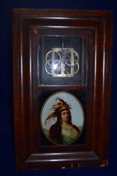 Seth Thomas 30 Hour Mantel Clock w Indian Painting: Seth Thomas 30 Hour Mantel Clock with 6" Painted zinc dial, Spring driven brass open plate movement, Reverse painted front with cigar store Indian. Clock is complete movement is working.