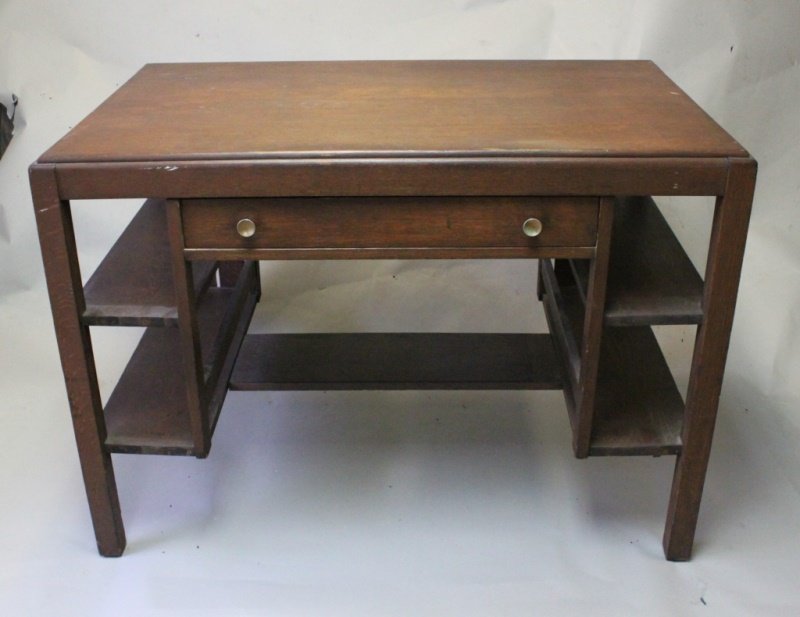 L & J G Stickley Mission Oak Arts & Crafts Desk: L & J G Stickley Mission Oak Arts & Crafts desk. The desk has a center drawer with book shelves. Very Good condition with original finish. Measures 23" x 43" x 30".