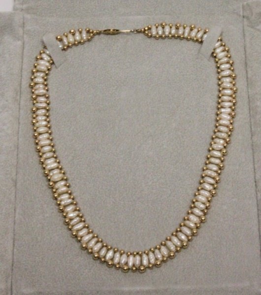Fortunoff Fresh Water Pearl & 14k Gold Choker: Fortunoff fresh water pearls in a parallel stranded gold bead choker necklace. Well crafted and in the original case. Excellent condition. Total length 16" x .5" Marked 14k on the clasp