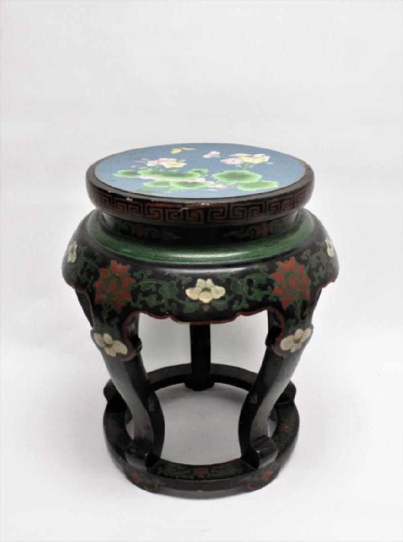 Early 20th C Cloisonne & Lacquer Garden Seat: Early 20th Century Chinese cloisonne-topped and decorated wooden garden seat with lacquer finish and floral motif. Very good condition, with some losses. Measures 16.5"dia x 19" tall.