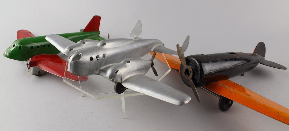 3 Wyandotte Pressed Steel Airplanes: 3 Wyandotte Pressed Steel Airplanes. Including dual prop, passenger and monocoupe. Nice lot. Longest 8 inches.