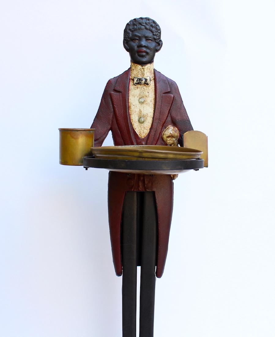 Cast Iron Black Butler Smoking Stand Americana: Cast Iron Black Butler Smoking Stand Americana. 35 inches tall, original paint.