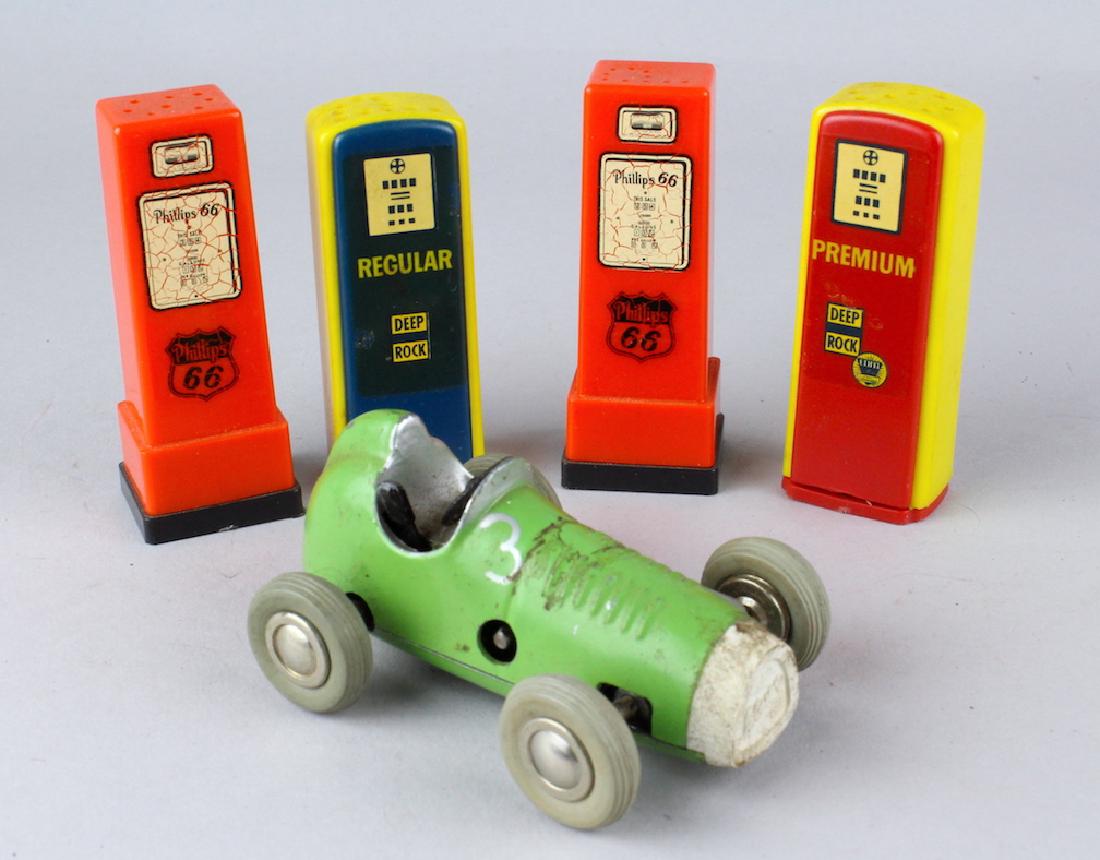 Schuco and Gas Pump Salt & Pepper Shakers: Schuco Race Car and Gas Pump Salt & Pepper Shakers.