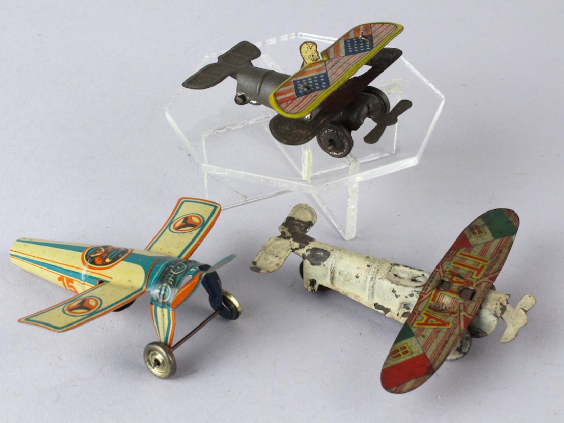 Pre-War Japan Tin Airplane Penny Toys (1 of 2)
