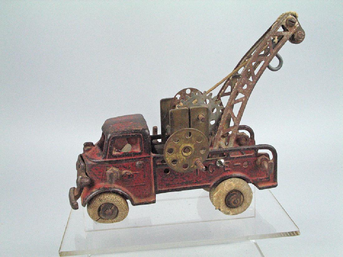 Arcade Cast Iron Ice Truck Modified Wrecker: Arcade Cast Iron Ice Truck, modified to tow truck. 7 inches long.