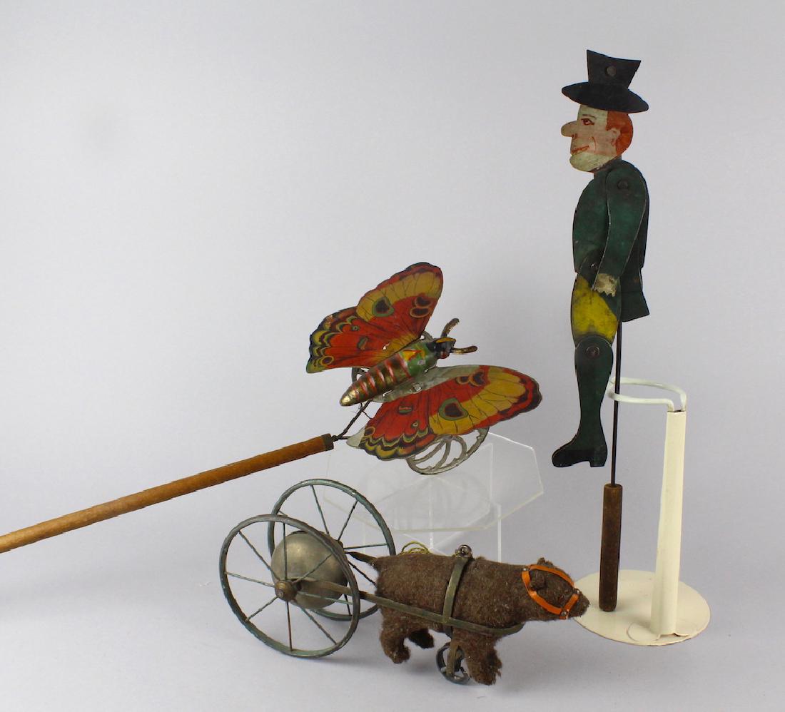 Bear Bell Toy, Butterfly Pull Toy, Dancing Man TIn (1 of 4)