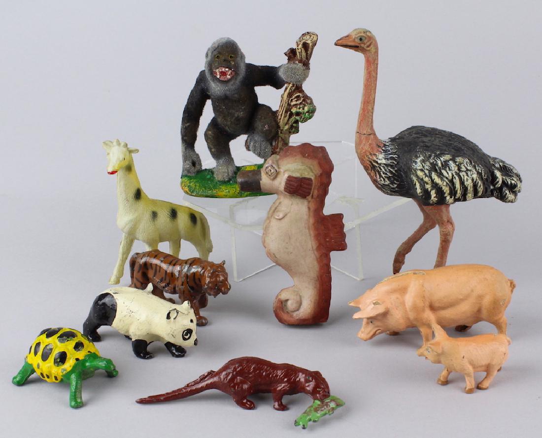 Lineol Ostrich, Bisque Seahorse, J Hill Otter &: Lineol German Ostrich, Bisque Seahorse, J Hill Otter & Lead panda, turtle & tiger. Austria and German pigs, celluloid giraffe and Ape with tree. Menagerie of toys.