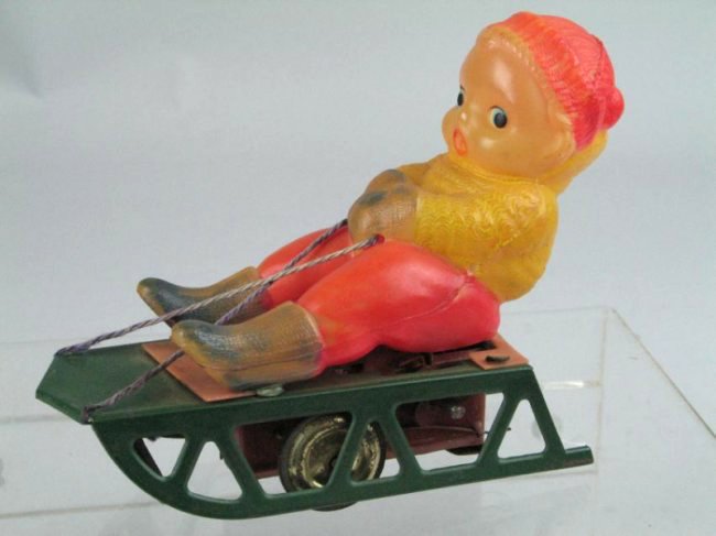 Alps Wind Up Celluloid Sled Boy Wind Up (1 of 2)